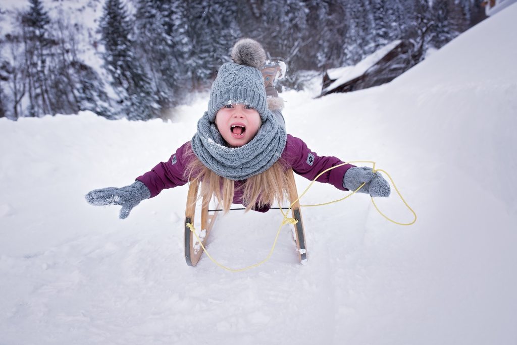 A child sledding.